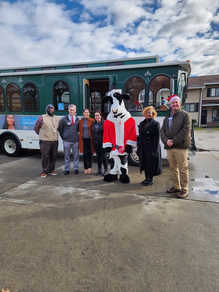 Elmore and community partners at the Jolly Trolly