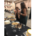 guests choosing from dessert table