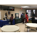 corner of job fair with several tables