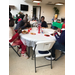 Residents enjoying at Christmas party inside at table