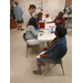 Nursing students providing residents with health screenings