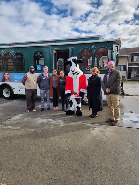 Holly Jolly Trolley 2022 with Clamentine Elmore and Transportation Authority in front of trolley